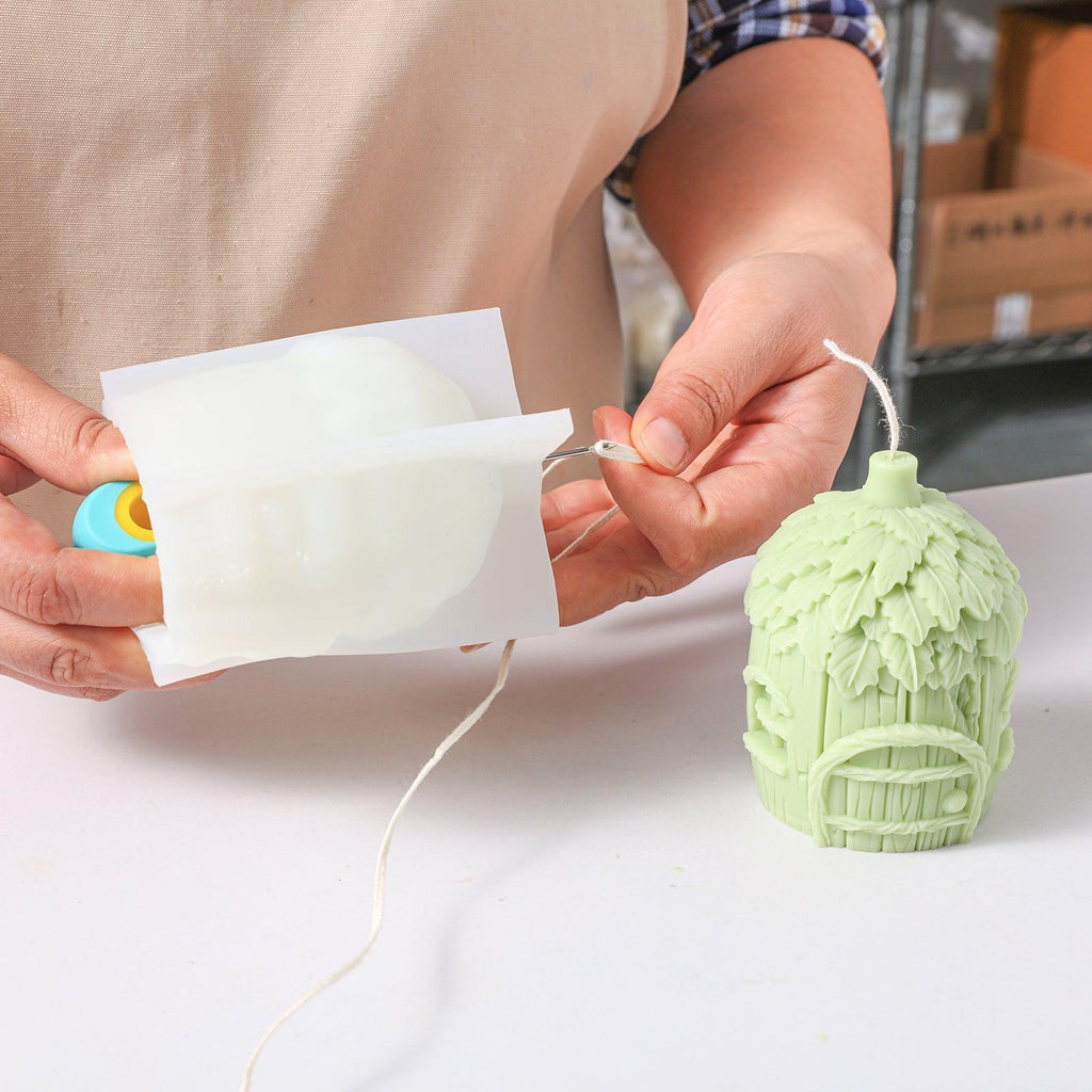 Miniature fairy house candle silicone mold featuring detailed shingled roof and round windows — view 2