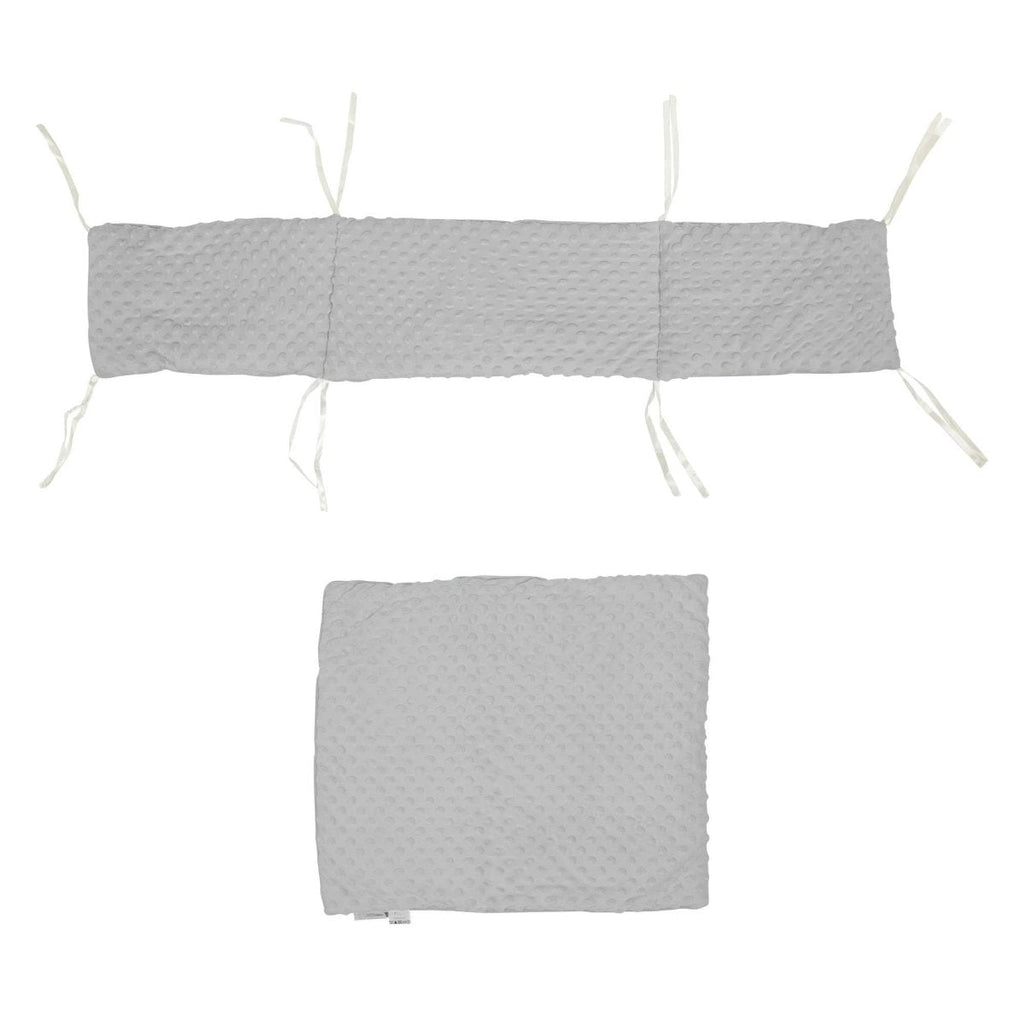 Two piece dimple crib bedding set featuring soft textured nursery quilt and matching protective bumper — view 5