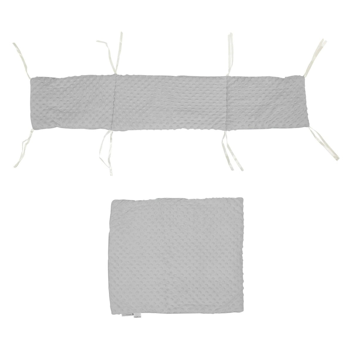 Two piece dimple crib bedding set featuring soft textured nursery quilt and matching protective bumper — view 5