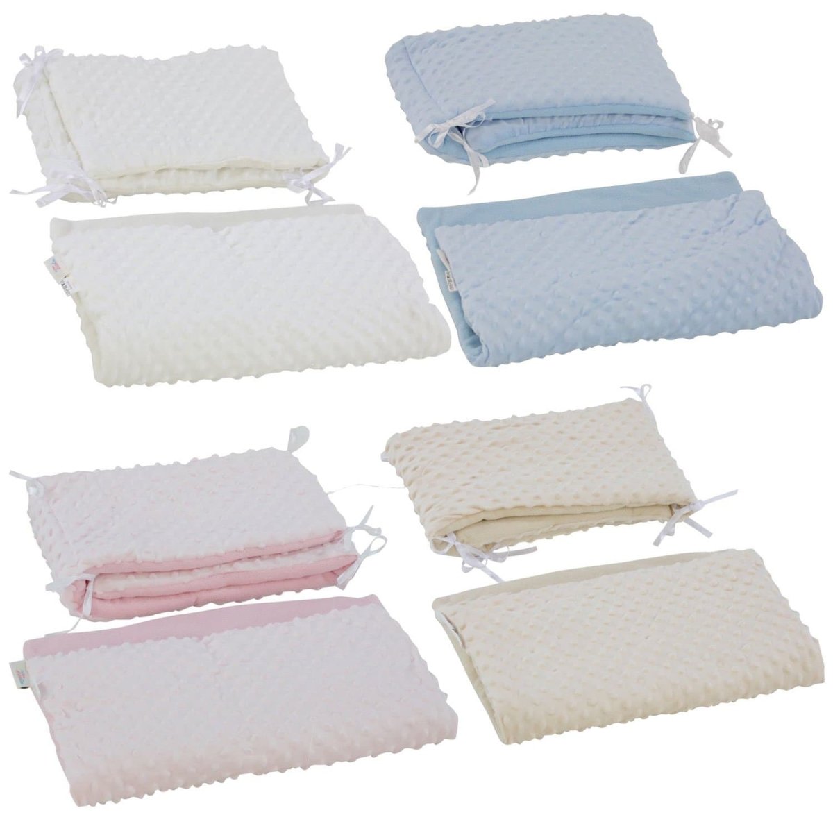Two piece dimple crib bedding set featuring soft textured nursery quilt and matching protective bumper — view 3