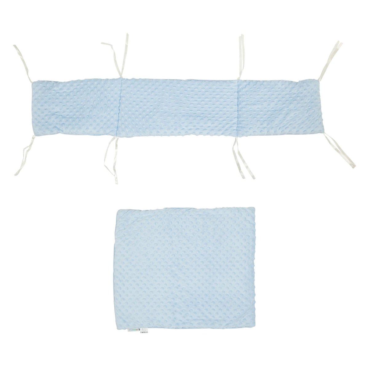 Two piece dimple crib bedding set featuring soft textured nursery quilt and matching protective bumper — view 4