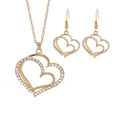 Heart shaped rhinestone necklace and matching earrings set in a silver zinc alloy finish