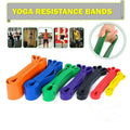Heavy duty natural latex resistance workout bands in multiple colors for yoga and strength training