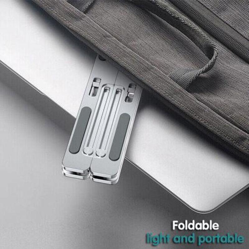 Silver aluminum adjustable laptop stand in open position with silicone anti-slip pads. — view 3