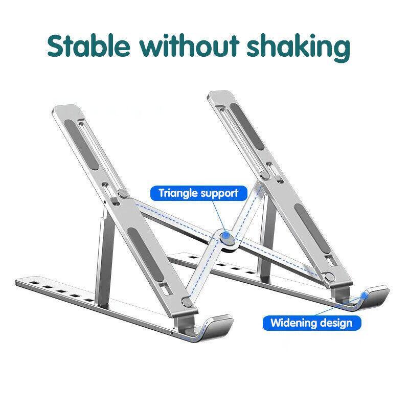 Silver aluminum adjustable laptop stand in open position with silicone anti-slip pads. — view 5
