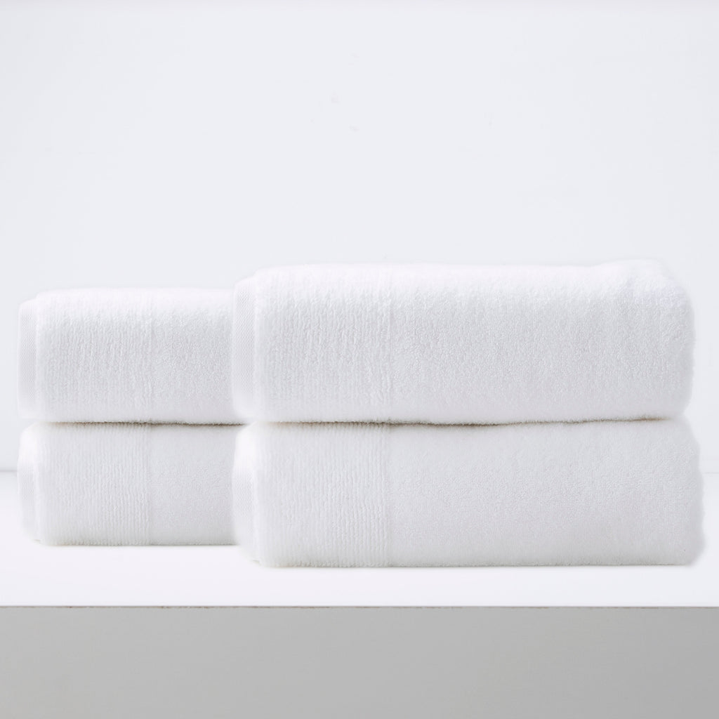 Crisp snow white Aireys quick dry bath towel set showing plush zero twist cotton material — view 5