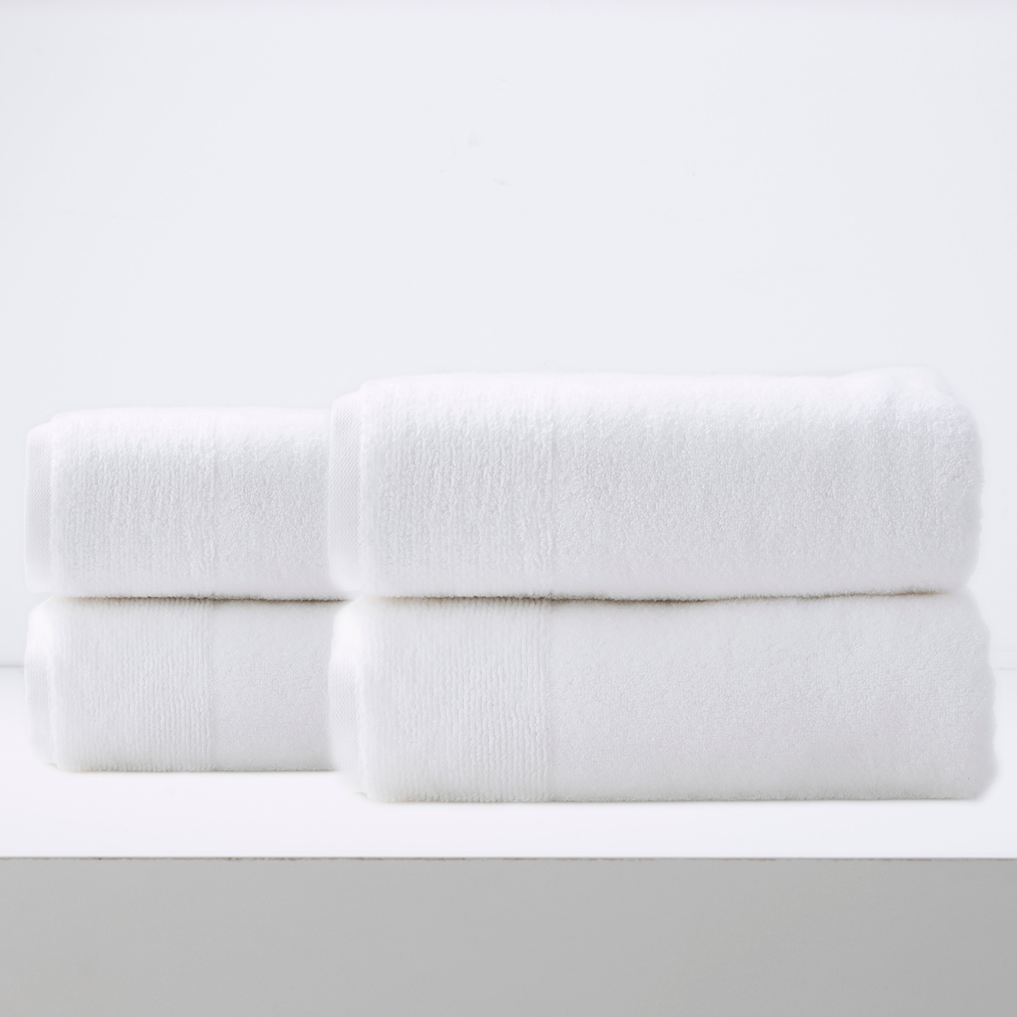 Crisp snow white Aireys quick dry bath towel set showing plush zero twist cotton material — view 5