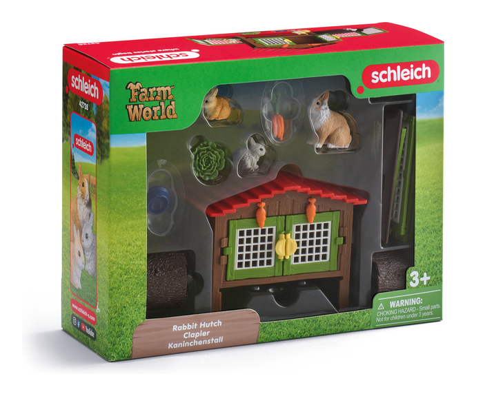 Schleich rabbit hutch playset with a mother rabbit, two baby bunnies, hollow log, and slide — view 2