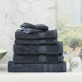 Stella Indigo bamboo cotton blend bath towel set neatly folded in a luxurious bathroom setting