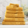 Stella mustard bamboo towel set folded, featuring plush yellow bamboo cotton fabric and woven details.