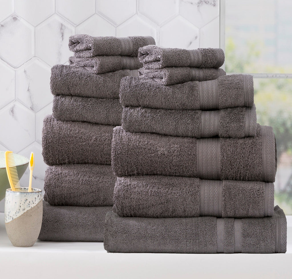 Charcoal grey bamboo cotton bath towel set neatly folded in a luxurious bathroom setting — view 2