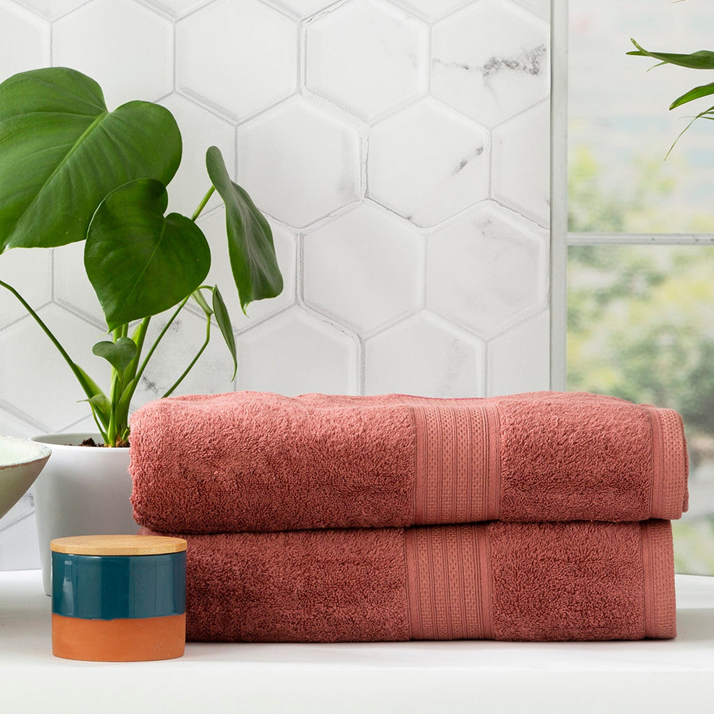 Stella bamboo cotton blend towel set in brick red neatly folded on a bathroom counter — view 3