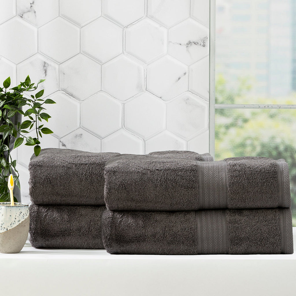 Charcoal grey bamboo cotton bath towel set neatly folded in a luxurious bathroom setting — view 4