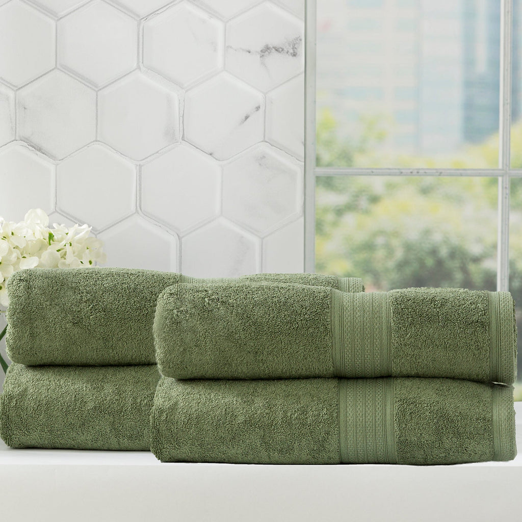 Jade green bamboo cotton bath towel set neatly stacked to showcase plush, absorbent texture — view 4