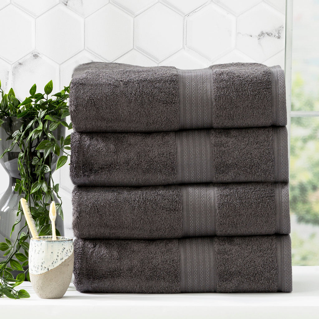Charcoal grey bamboo cotton bath towel set neatly folded in a luxurious bathroom setting — view 5