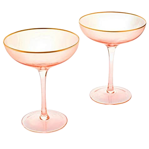 Set of two blush pink stemless coupe glasses with gold gilded rims and bubble design.