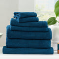 Cobblestone ribbed bath towel set in ink blue folded plush cotton luxury bathroom linens