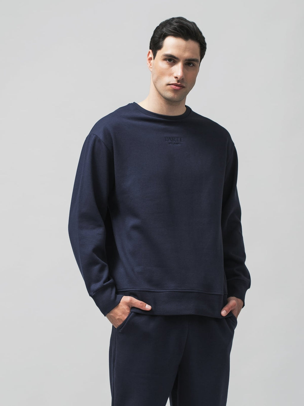 Classic blue men's sweater made of a breathable cotton and polyester blend for everyday comfort