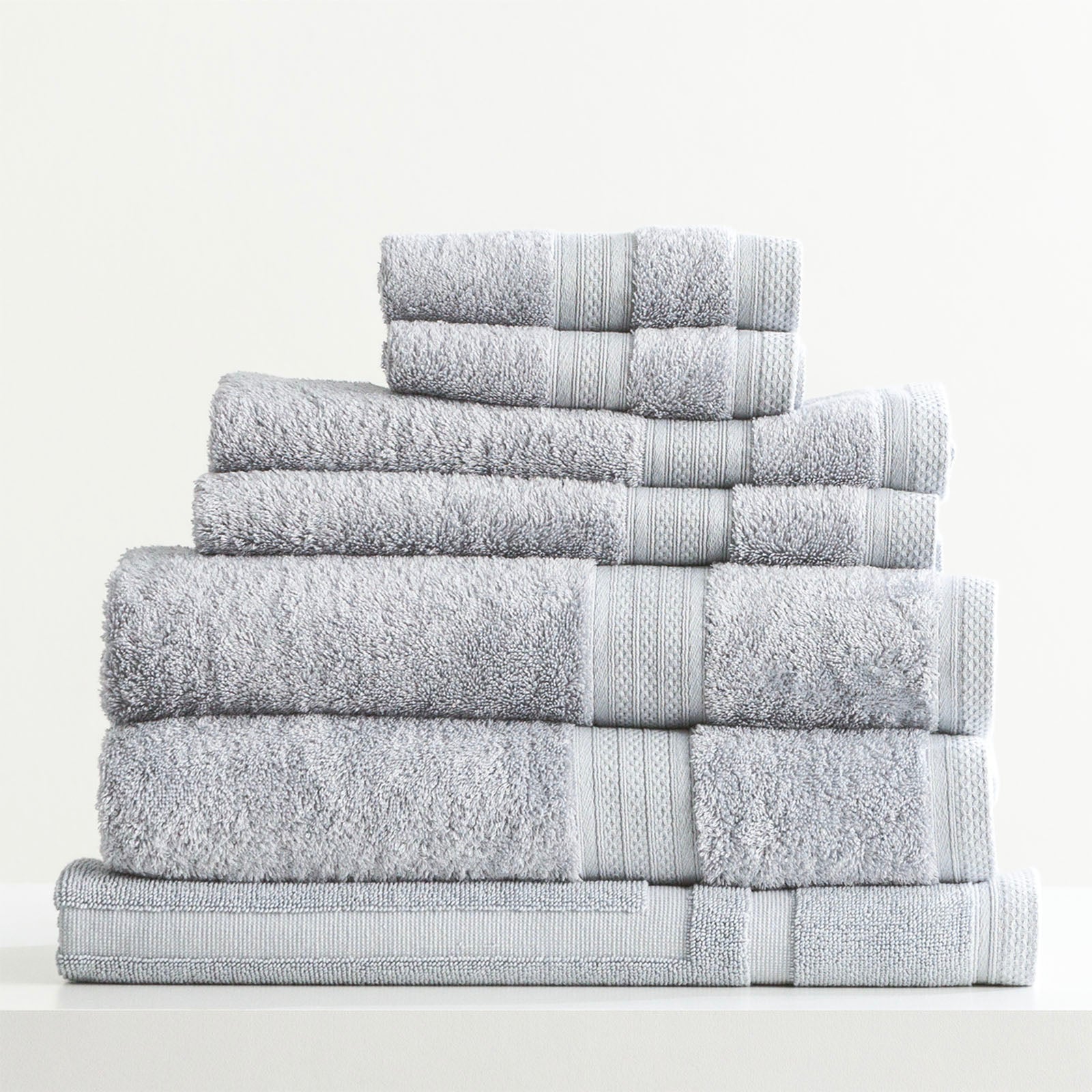 Stella bamboo towel set in silver, folded luxury bath towels with hanger loops