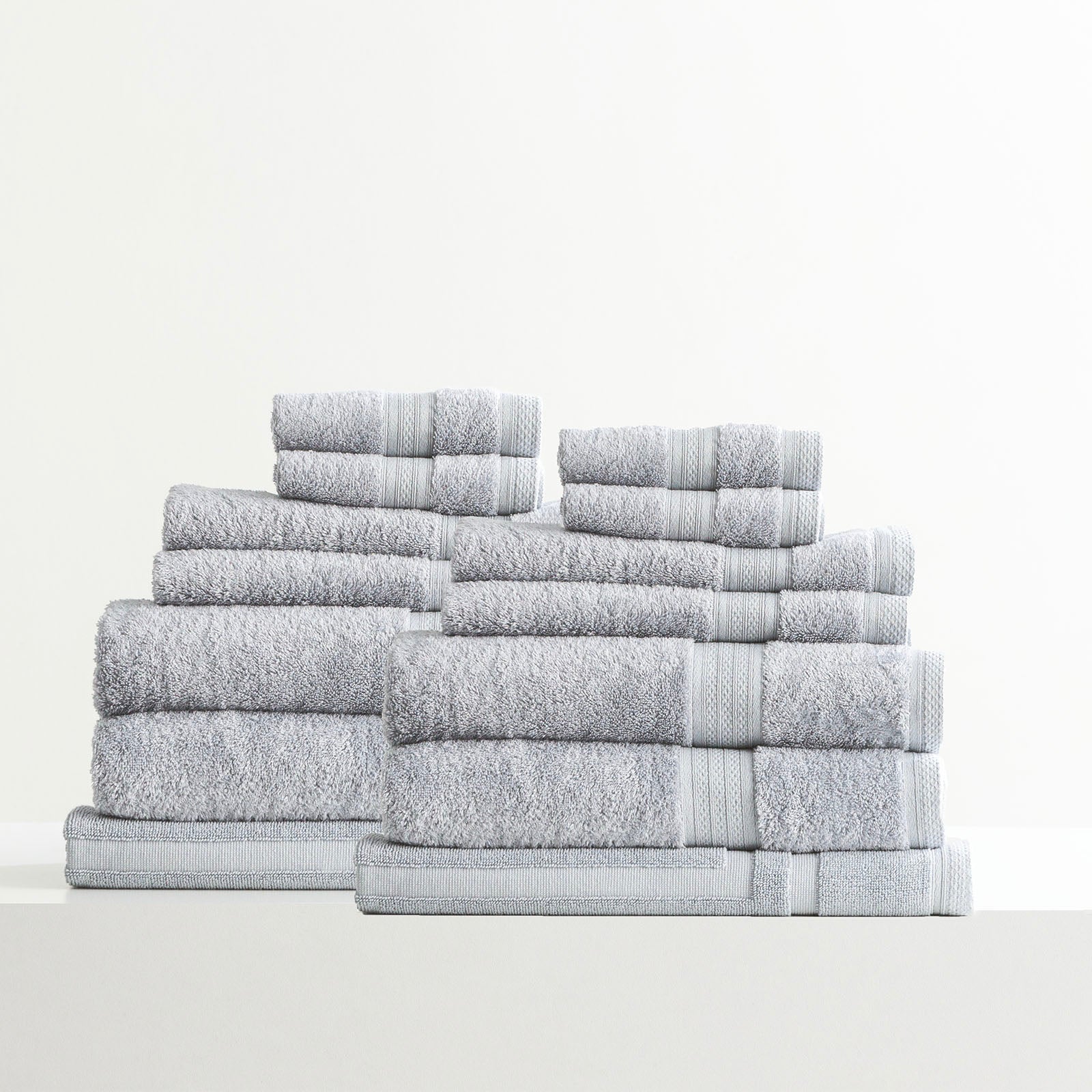 Stella bamboo towel set in silver, folded luxury bath towels with hanger loops — view 2
