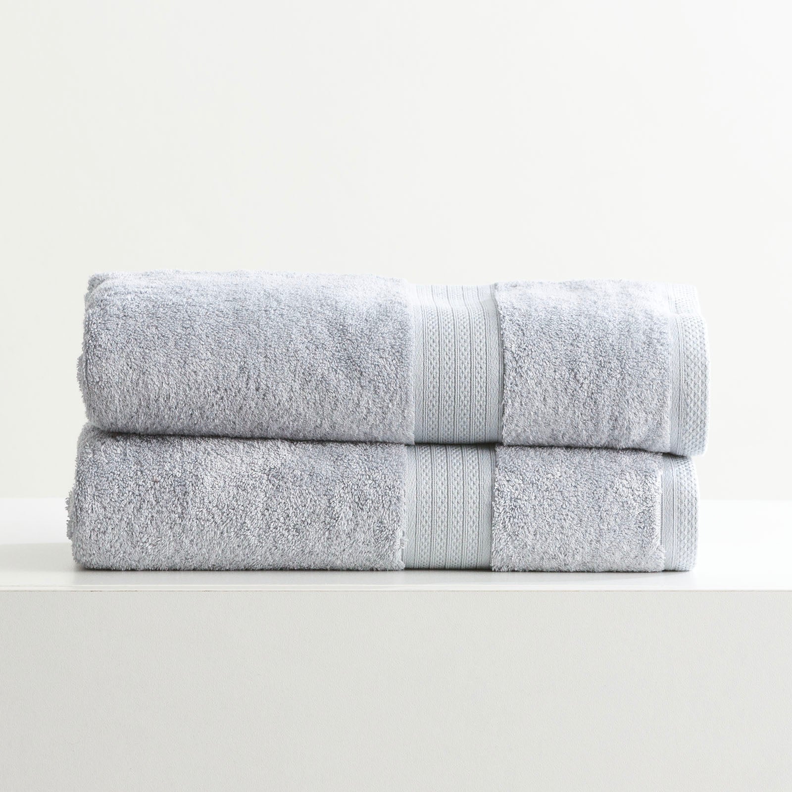 Stella bamboo towel set in silver, folded luxury bath towels with hanger loops — view 3
