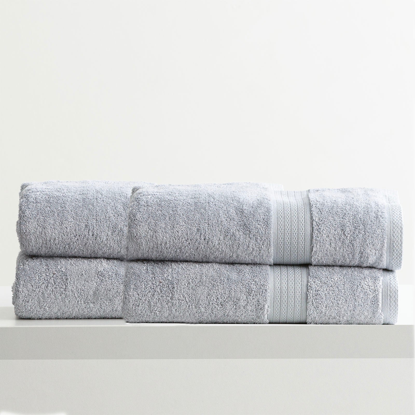 Stella bamboo towel set in silver, folded luxury bath towels with hanger loops — view 4