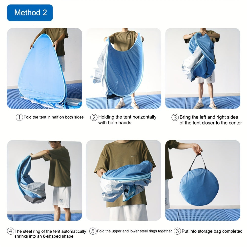 Portable waterproof beach tent in blue with sunshade pitched outdoors on sand — view 5