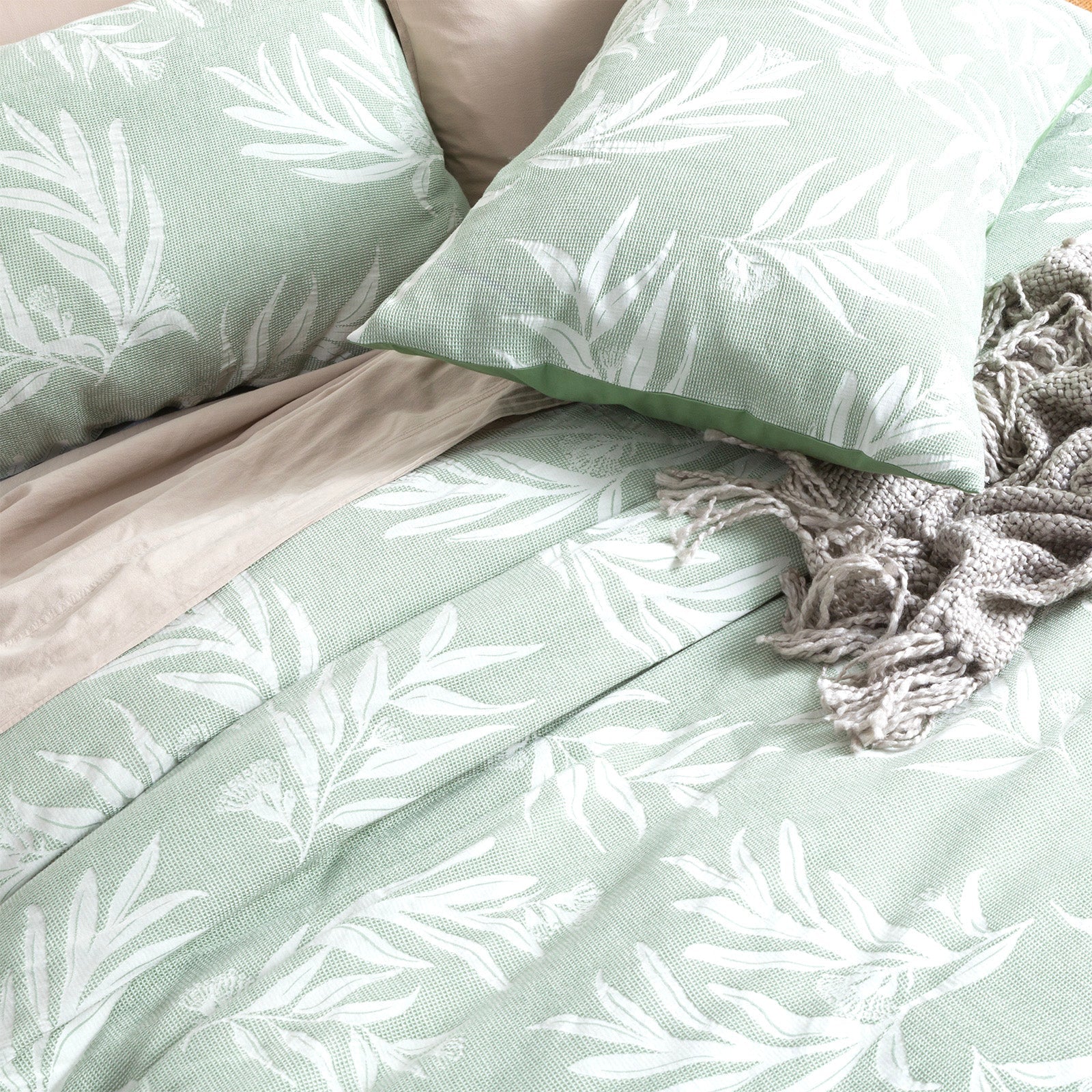 Juniper green native cotton jacquard quilt cover set with matching pillowcases and delicate botanical pattern. — view 5