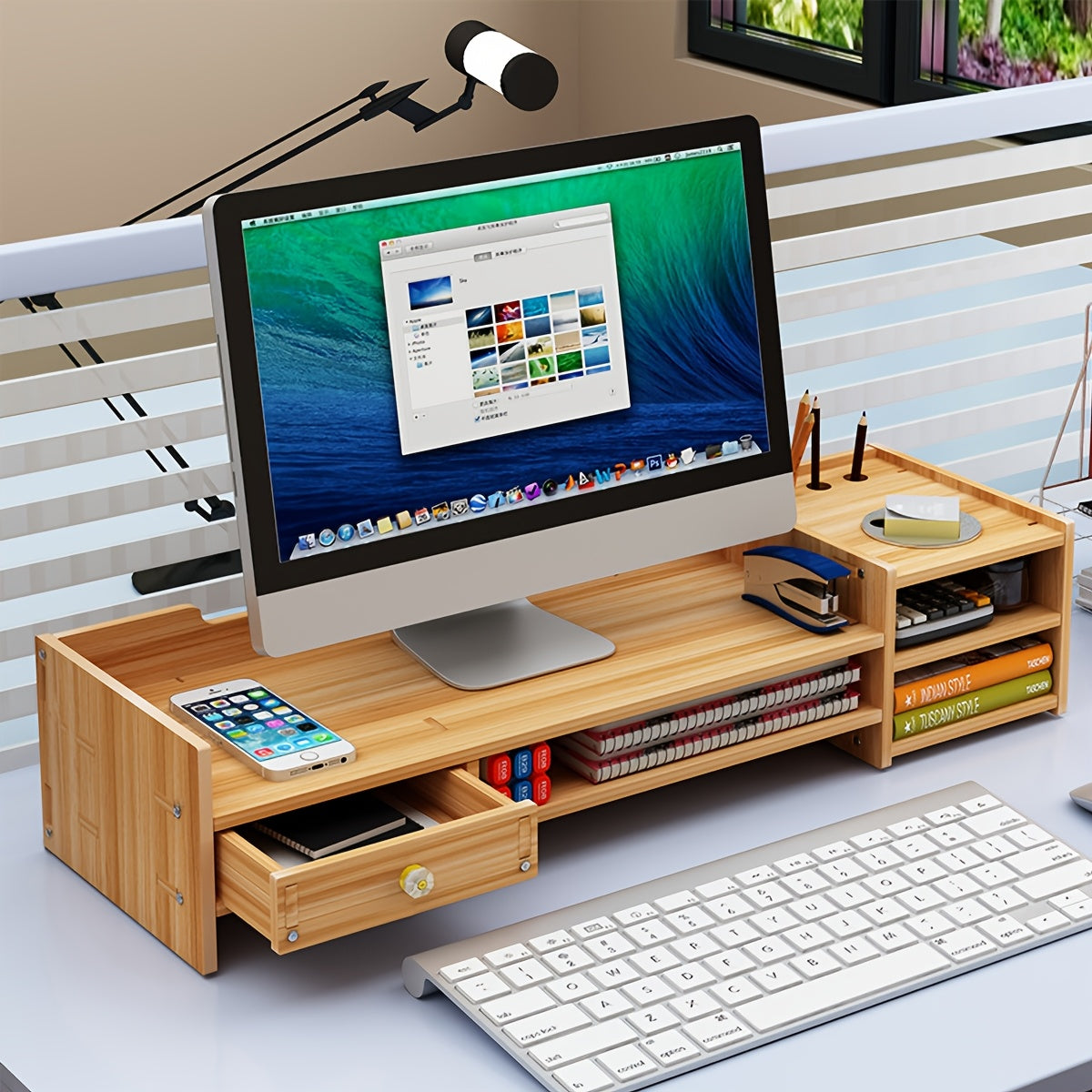 Cherry wood rectangular monitor stand with a built-in storage drawer and keyboard tray underneath. — view 2