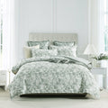 Green Indiana jacquard quilt cover set on a bed showing textured cotton matelasse weave