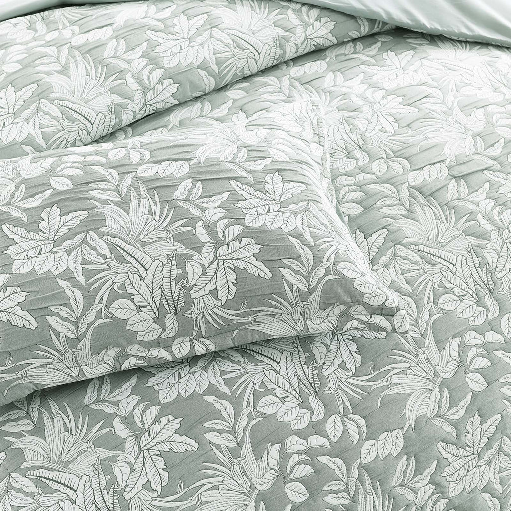 Green Indiana jacquard quilt cover set on a bed showing textured cotton matelasse weave — view 4