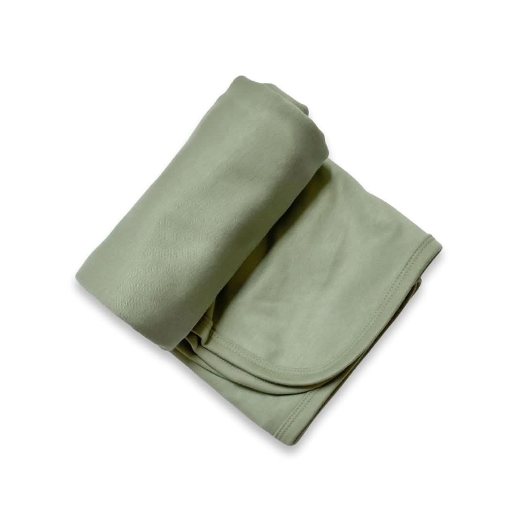 Berry pink baby bamboo swaddle blanket folded neatly, featuring soft and stretchy breathable fabric. — view 2