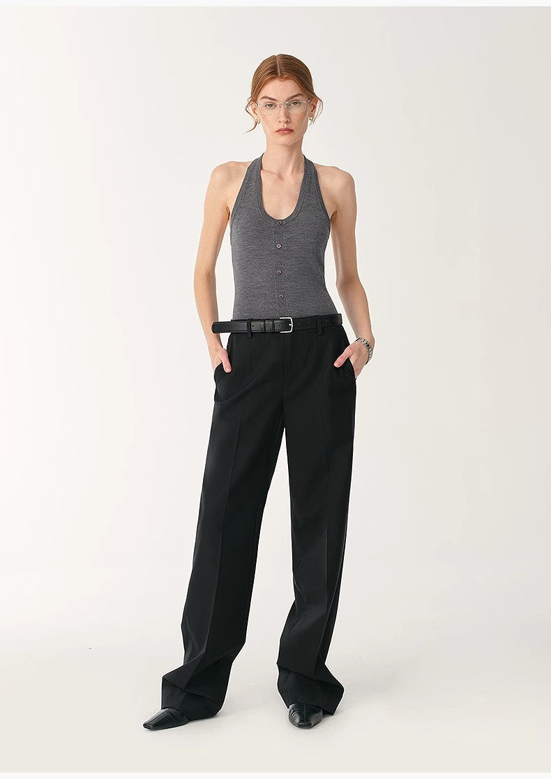 Women's slim fit wool halter neck bodysuit with shell buttons and layered snap closure.