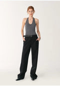 Women's slim fit wool halter neck bodysuit with shell buttons and layered snap closure.