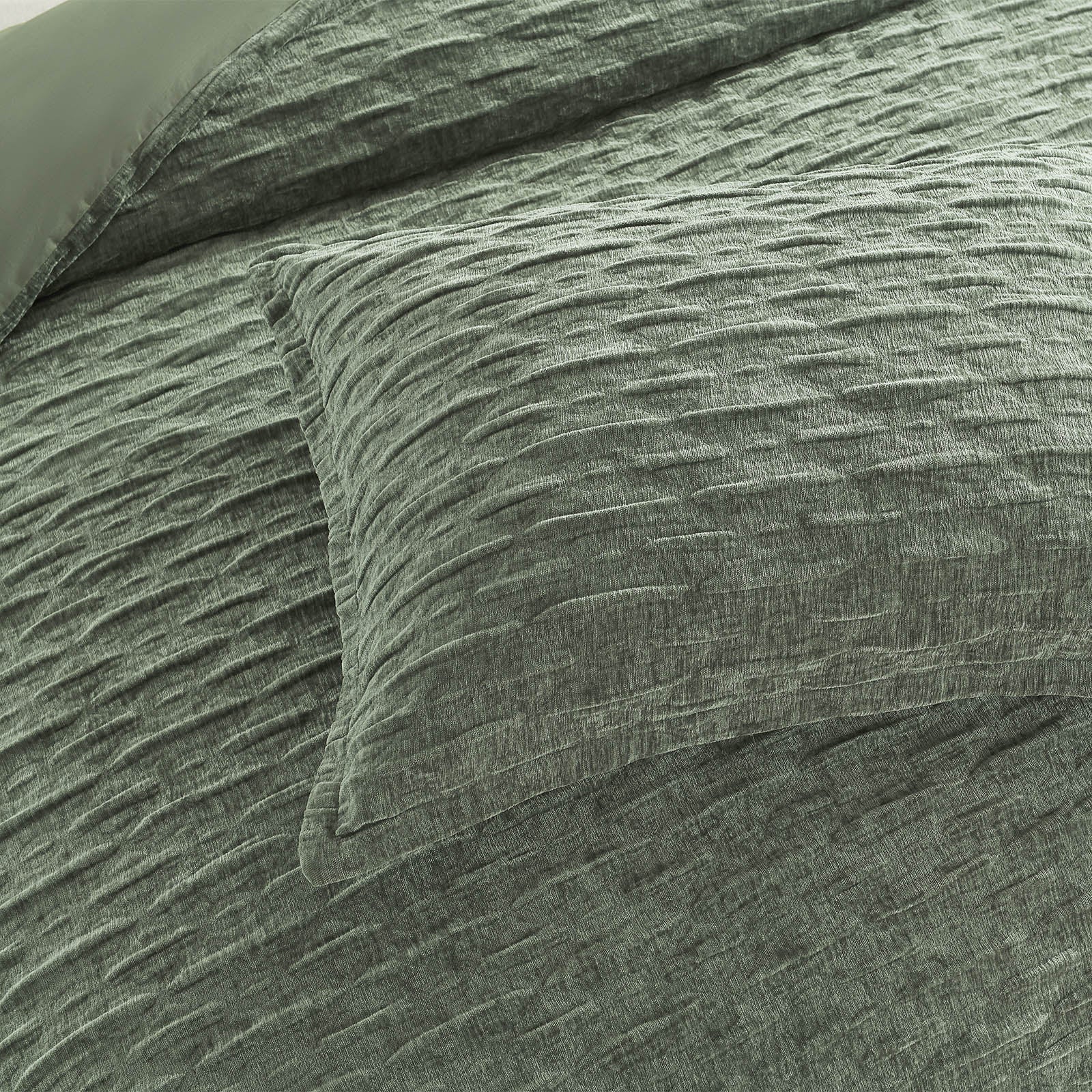 Harper jacquard quilt cover set in deep juniper green with subtle crinkle velvet texture — view 4