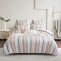 Layla cotton quilt cover set featuring striped seersucker in blush clay ivory and airy blue