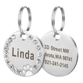 Personalized round metal dog tag keychain with custom engraving for pet owners and animal lovers