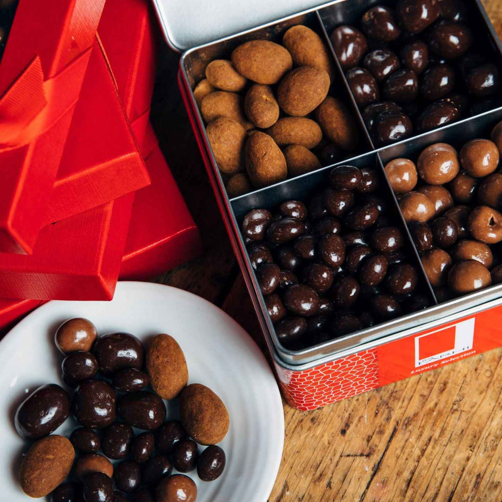 Luxury assorted chocolate-coated fruits and nuts presented in an elegant, reusable 850g gift tin — view 2