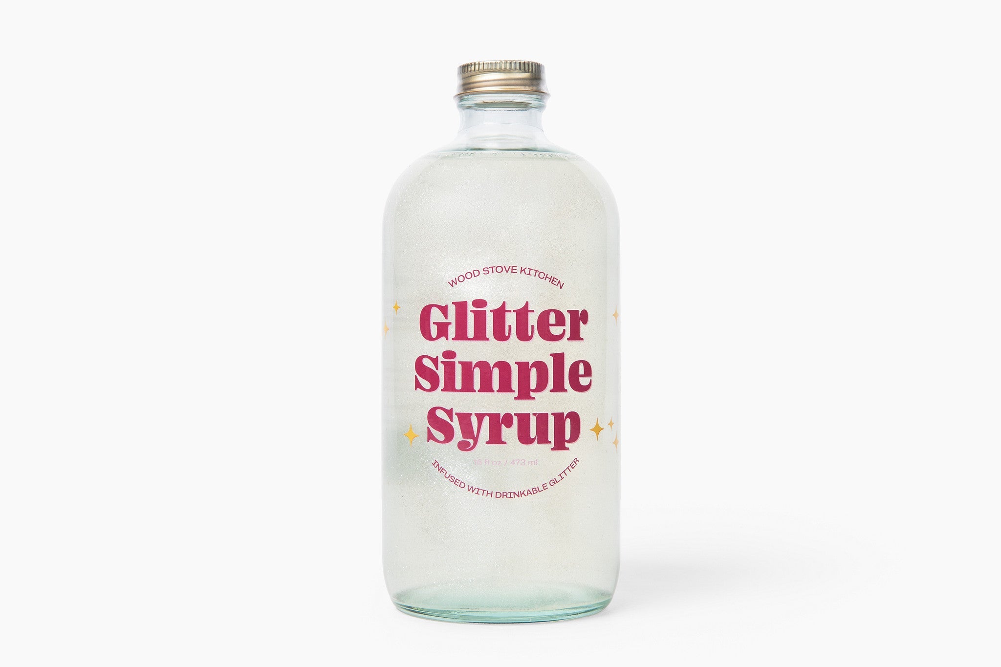 Glitter simple syrup in a sixteen ounce bottle, shimmering liquid for artisanal cocktails and mocktails