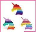 Unicorn shaped push pop fidget sensory toy made of colorful washable silicone for stress relief