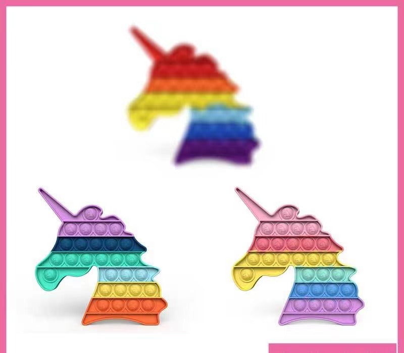 Unicorn shaped push pop fidget sensory toy made of colorful washable silicone for stress relief