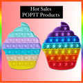 Ice cream shaped push pop fidget sensory toy in bright rainbow colors made of silicone