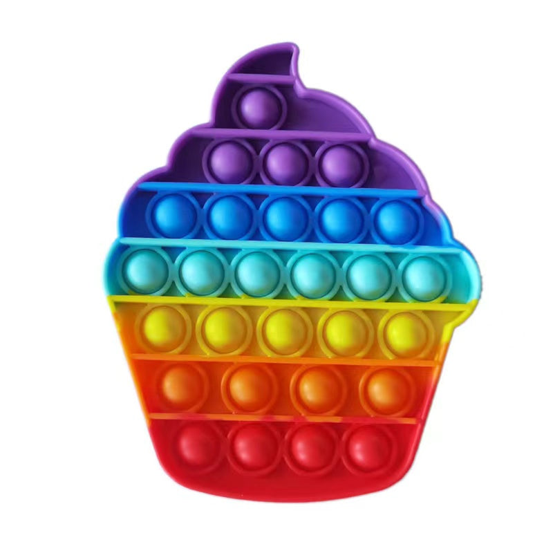 Ice cream shaped push pop fidget sensory toy in bright rainbow colors made of silicone — view 2