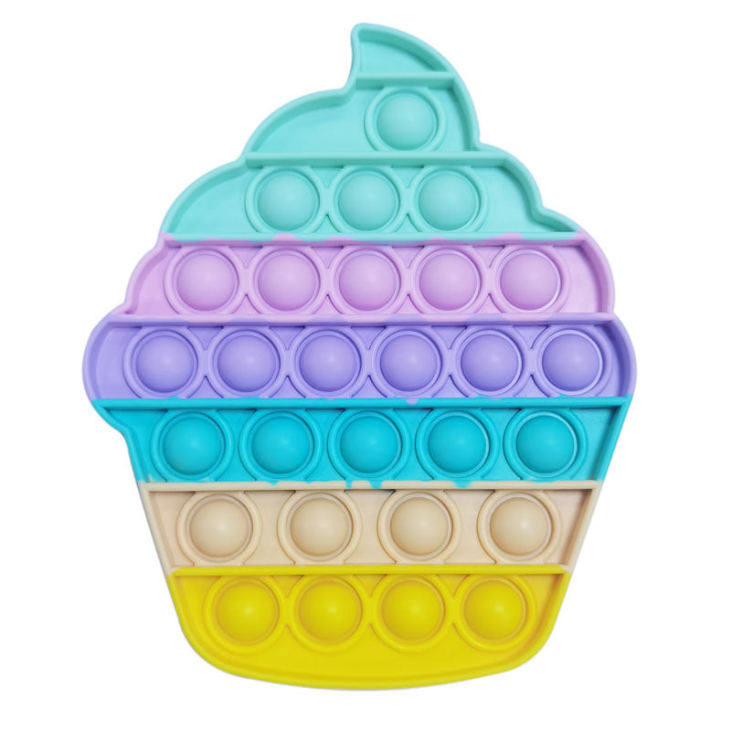 Ice cream shaped push pop fidget sensory toy in bright rainbow colors made of silicone — view 3
