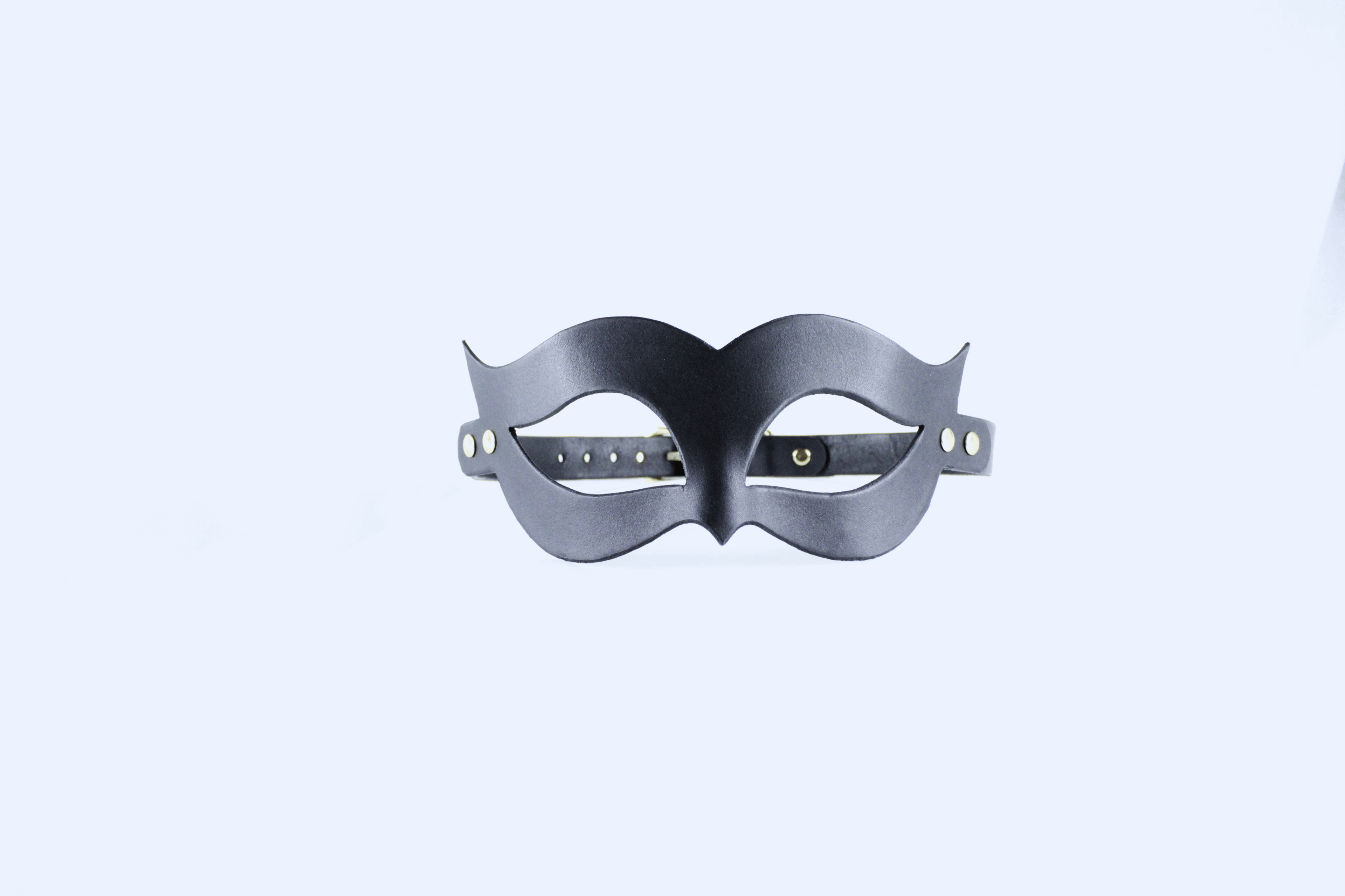 Handmade black leather fetish mask with gold-tone rivets and adjustable buckle strap for a secure fit. — view 2