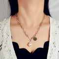 Silver chain pearl disc necklace for women featuring a shiny pendant for elegant party wear