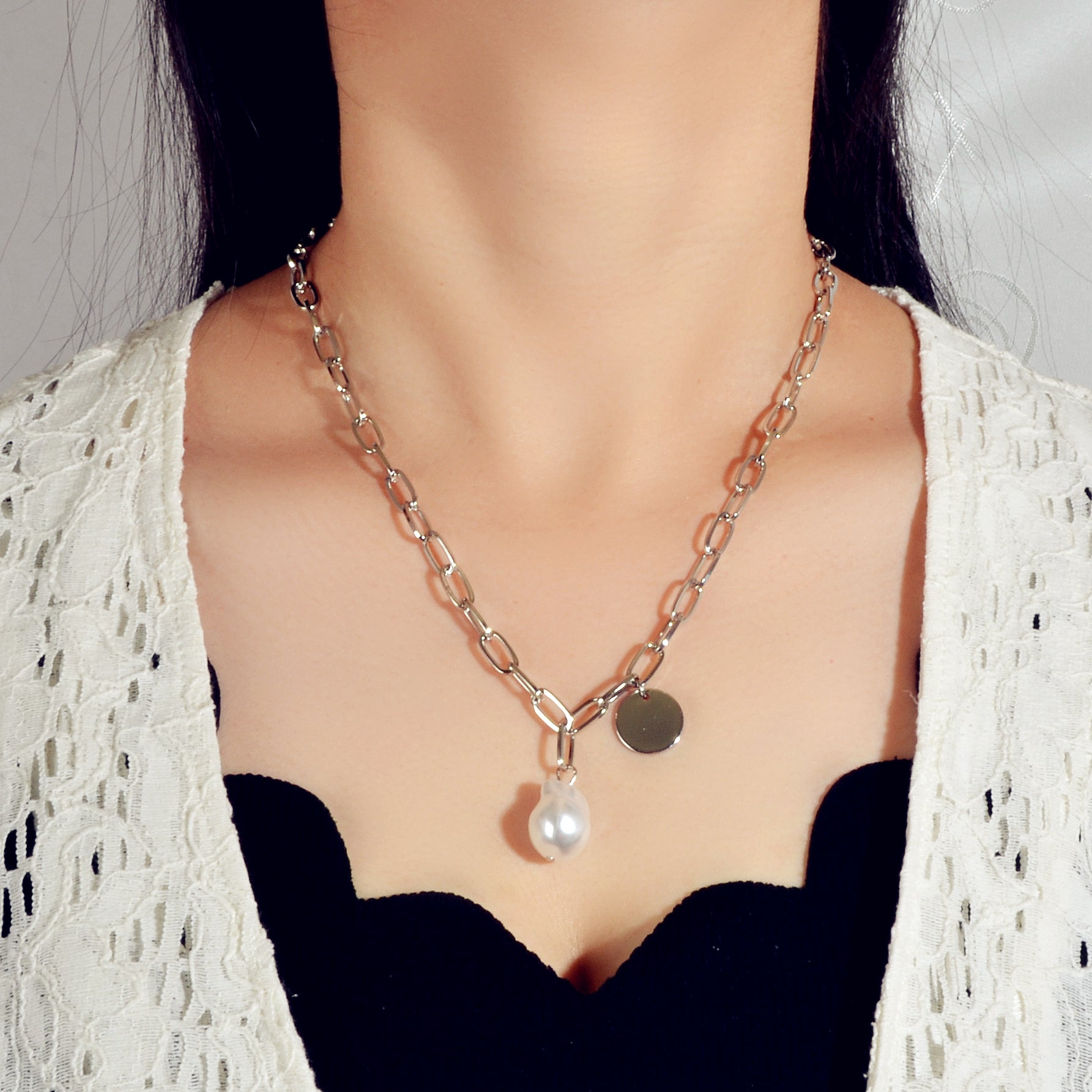 Silver chain pearl disc necklace for women featuring a shiny pendant for elegant party wear