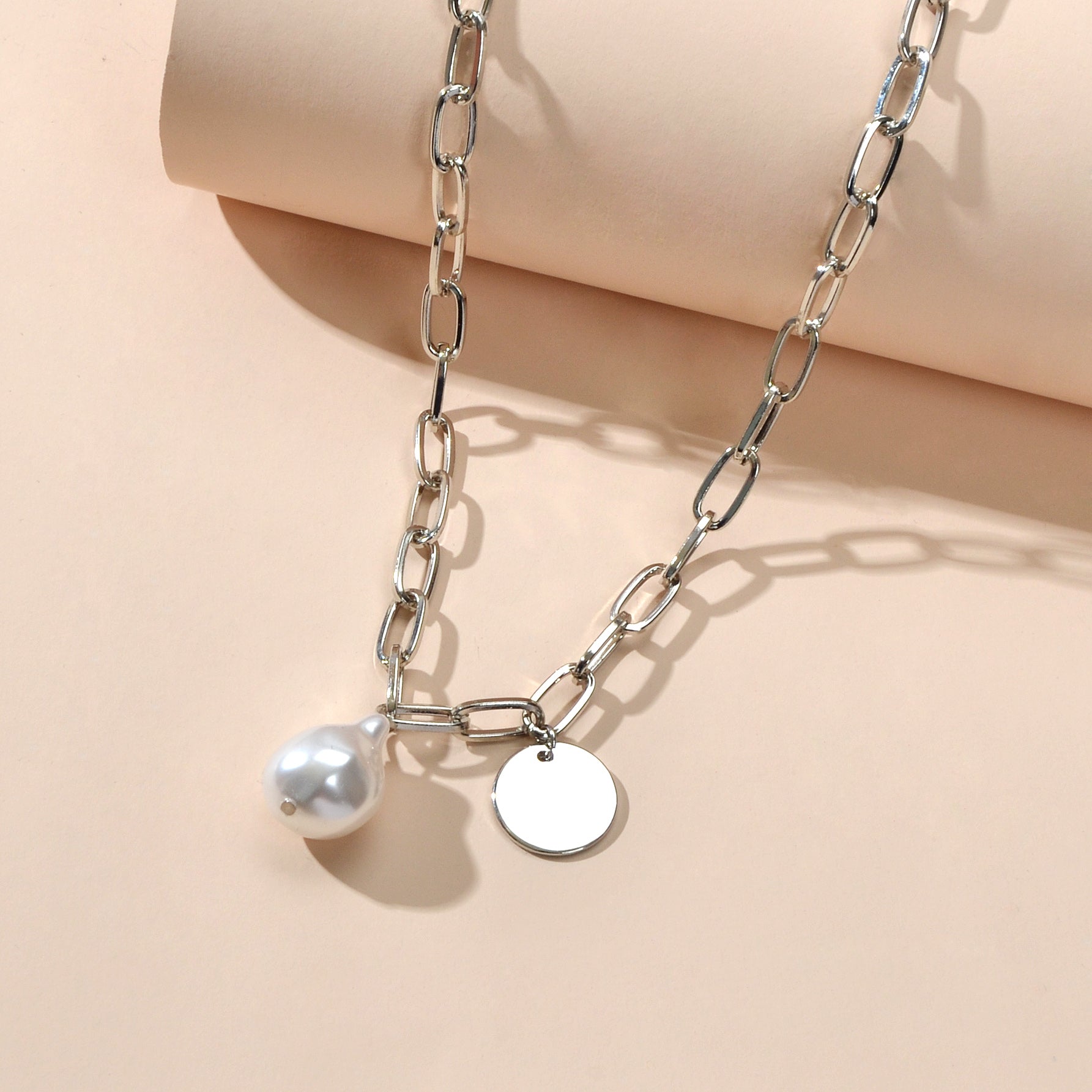 Silver chain pearl disc necklace for women featuring a shiny pendant for elegant party wear — view 2