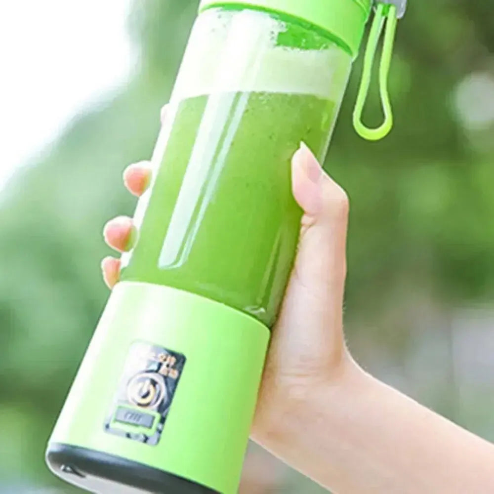 Green portable electric fruit juicer with carrying rope and stainless steel blades for travel smoothies. — view 4