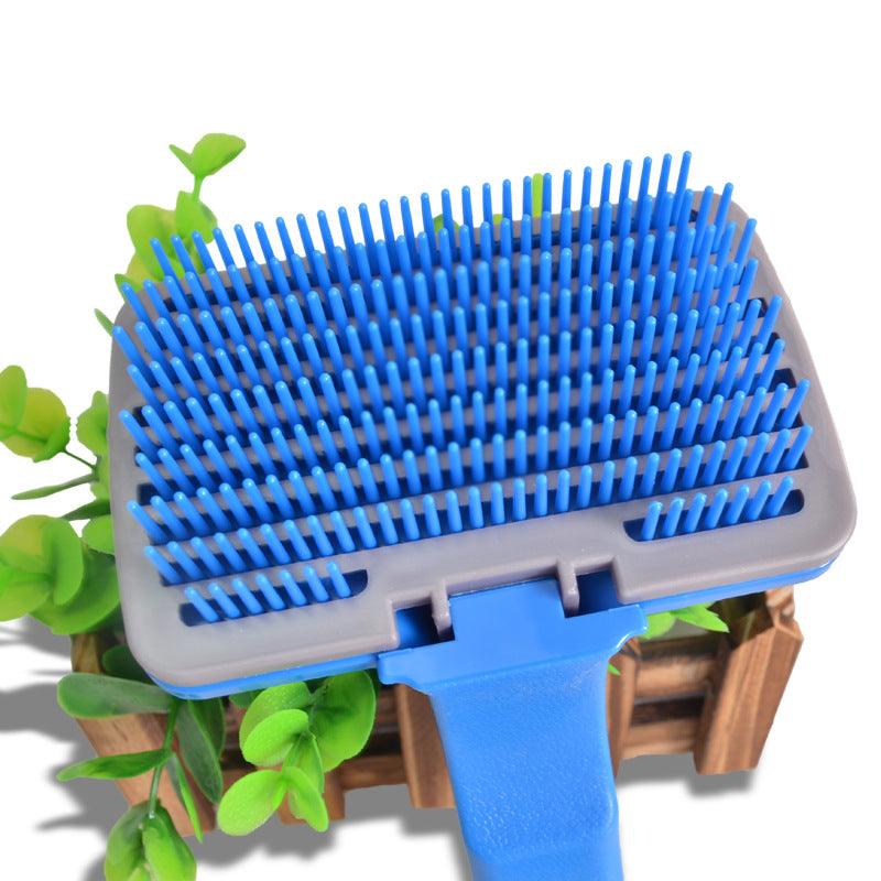 Self-cleaning pet hair grooming tool and brush with ergonomic handle for dogs and cats — view 2
